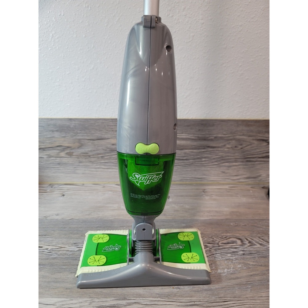 swiffer sweeper vacuum Used No cord does work Handle pins broke